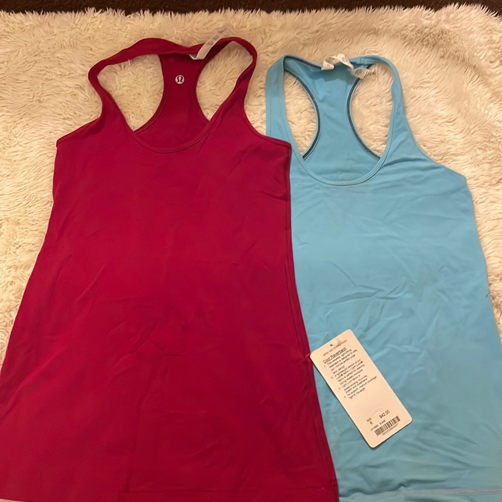 2 womens lululemon tanks.